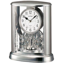 Rhythm Pendule à Poser Animée Grise Boules Rotatives En Cristal