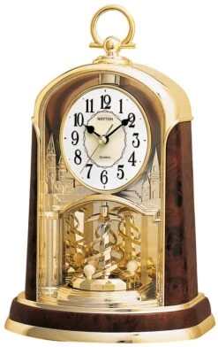 Rhythm Pendule à Poser Animée Avec Bélière Dorée